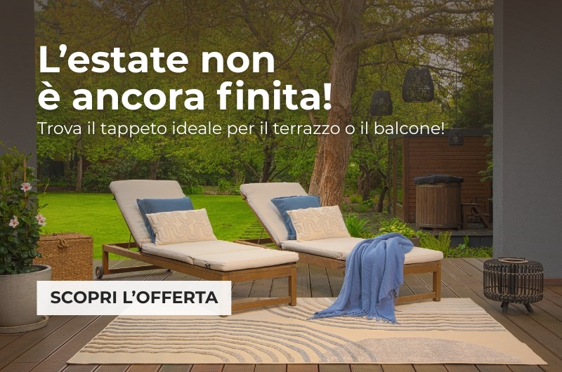 Tappeto da esterno beige con motivo su una terrazza in legno